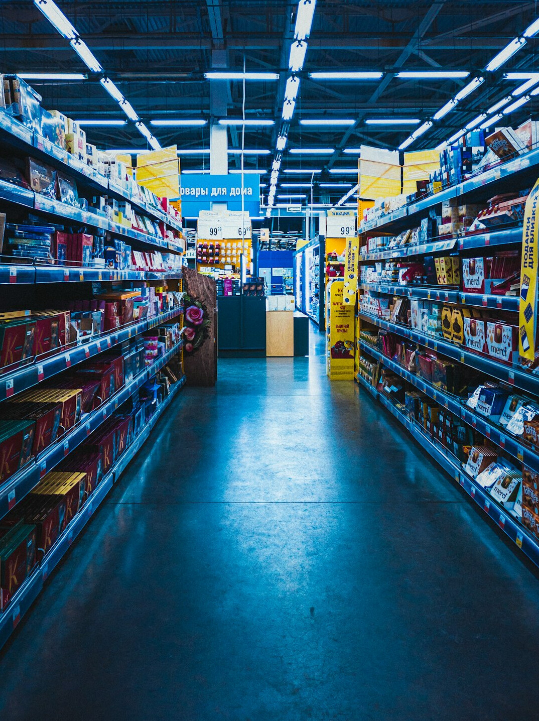 supermarket aisle with customers