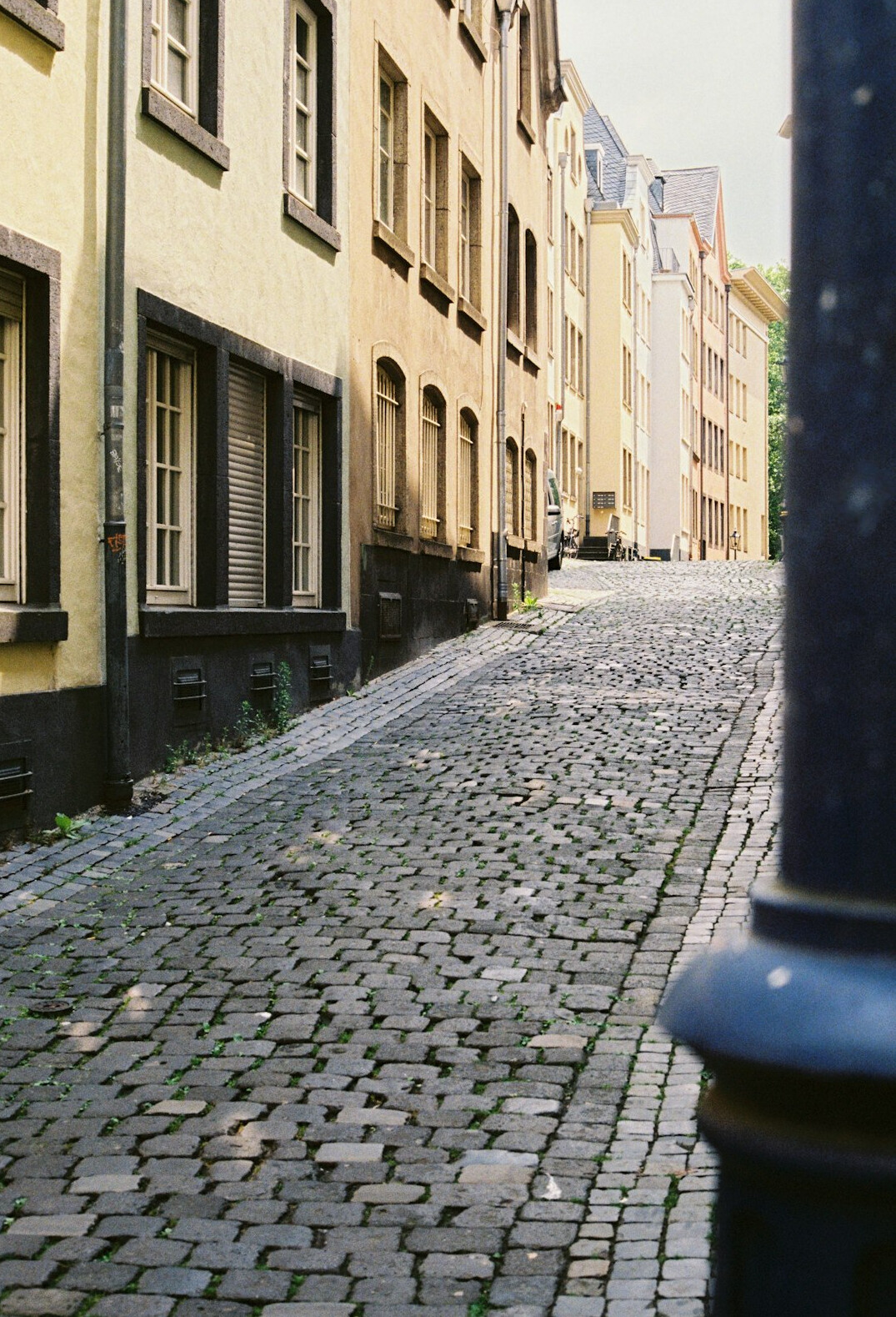 Narrow historic alley in Colonia del Sacramento with lantern light